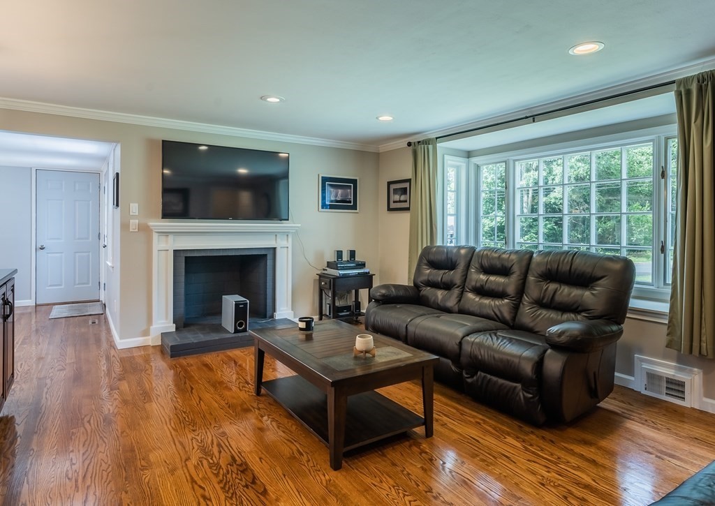 2 East Colonial Road Wilbraham, MA 01095 - Photo 4 of 42 a living room with furniture and a fireplace