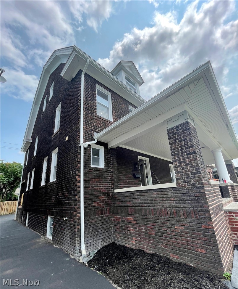 1843 Farmington Road Cleveland, OH 44112 - Photo 2 of 48 All new windows, brickwork, tuck-pointing, roof, etc