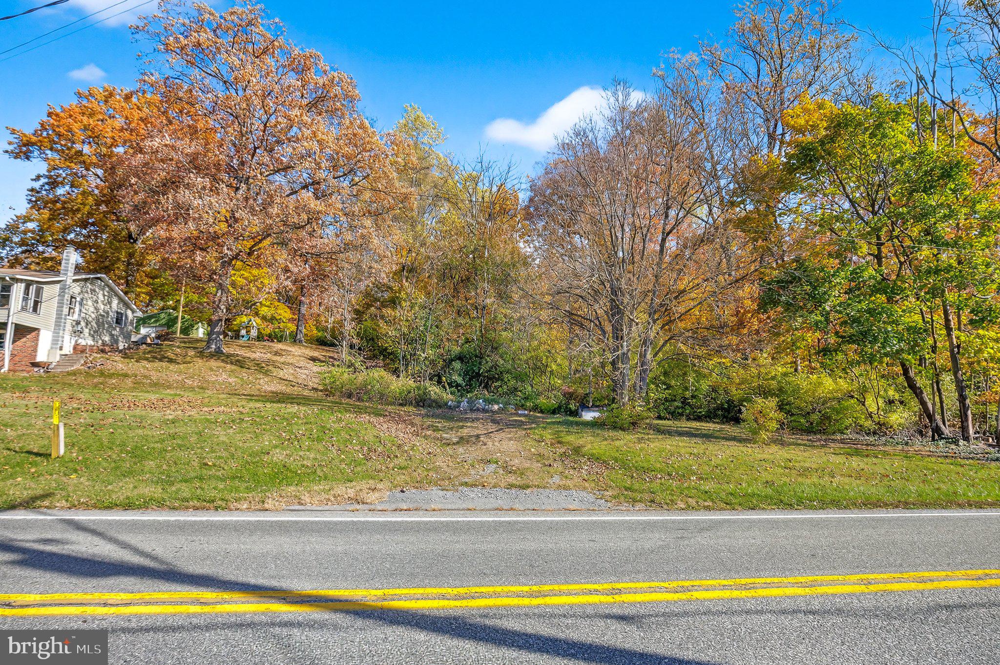 303 West Swartzville Road Reinholds, PA 17569 - Photo 7 of 17 a view of a swimming pool with a yard