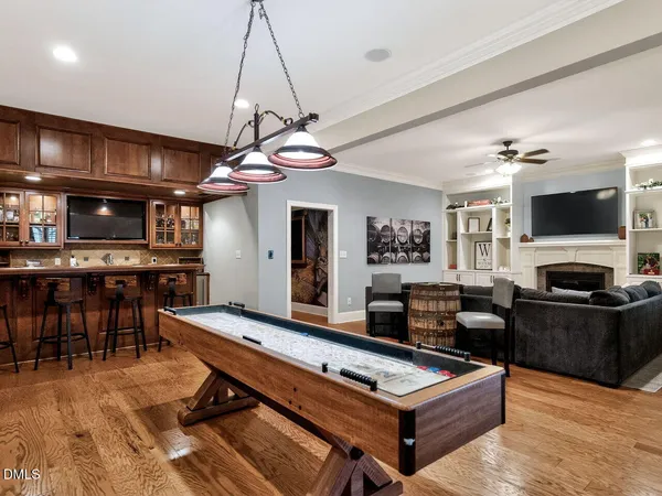 a kitchen with a table and chairs in it