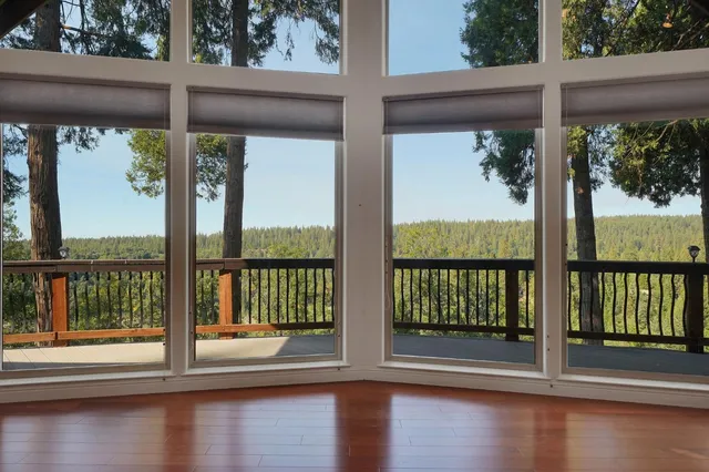 a kitchen with granite countertop a sink and a wooden cabinets