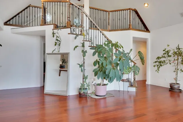 a workspace with furniture and wooden floor