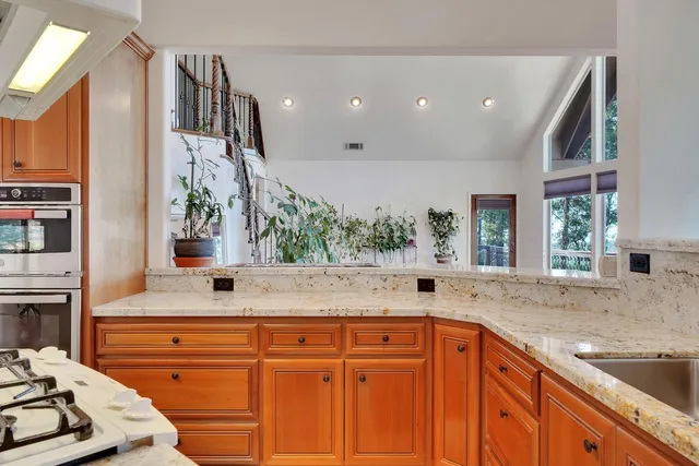 a bedroom with bed and window