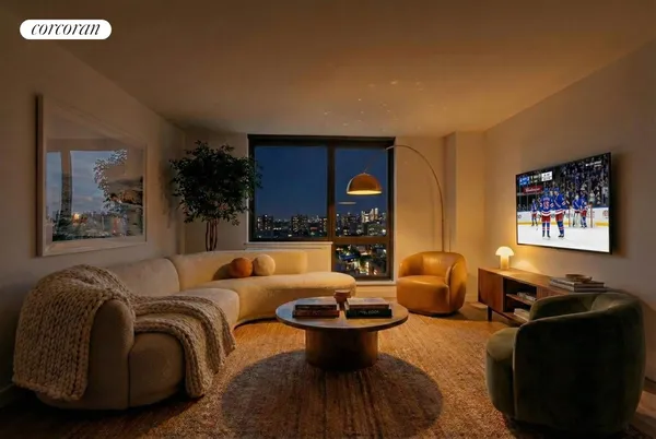 a living room with furniture a rug and a lamp
