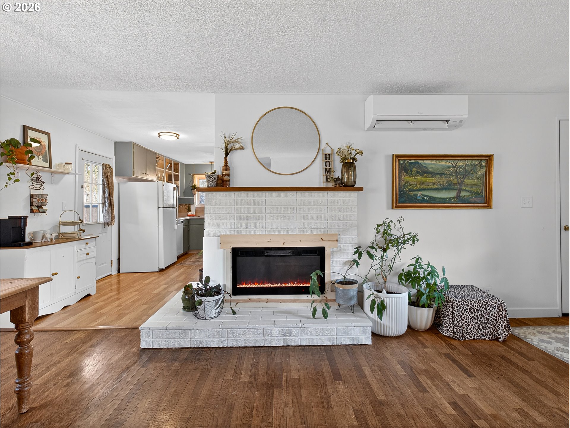 2230 Cleveland Street Eugene, OR 97405 - Photo 13 of 37 a living room with furniture and a fireplace