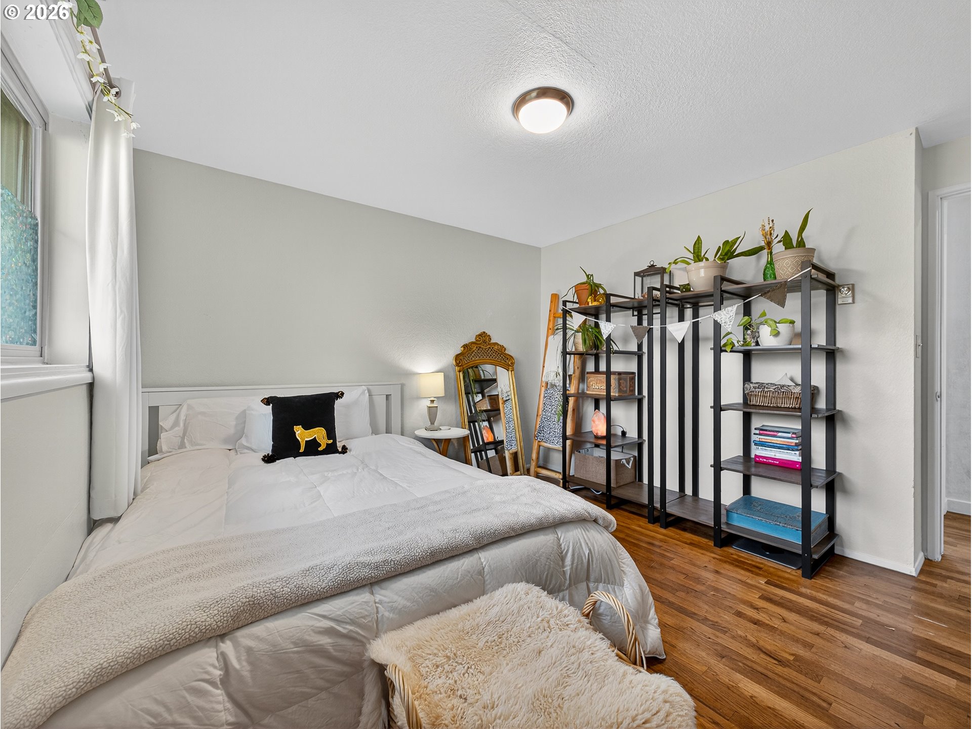 2230 Cleveland Street Eugene, OR 97405 - Photo 21 of 37 a bed room with a bed and a tv