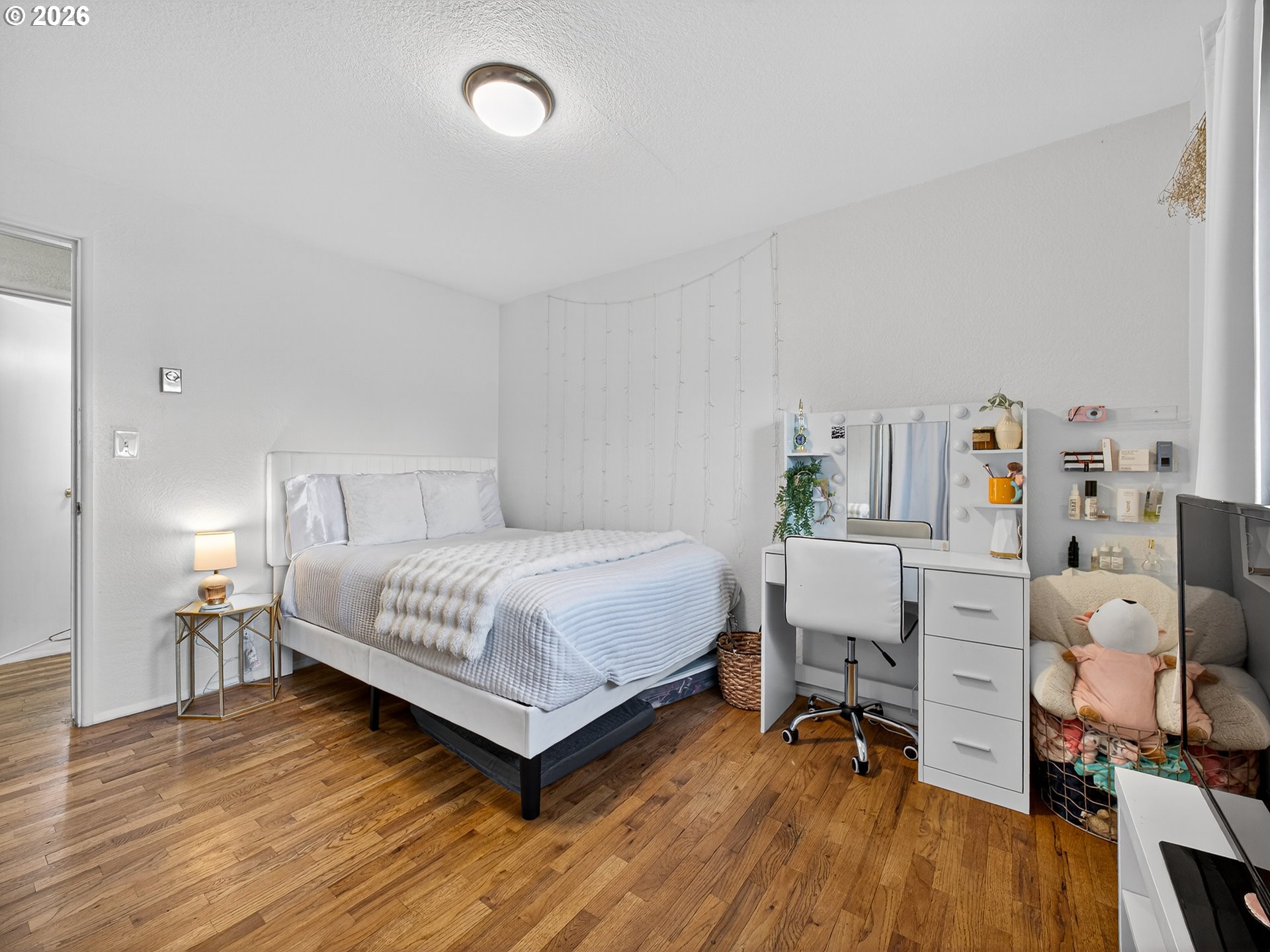 2230 Cleveland Street Eugene, OR 97405 - Photo 26 of 37 a bedroom with a bed and a desk in it