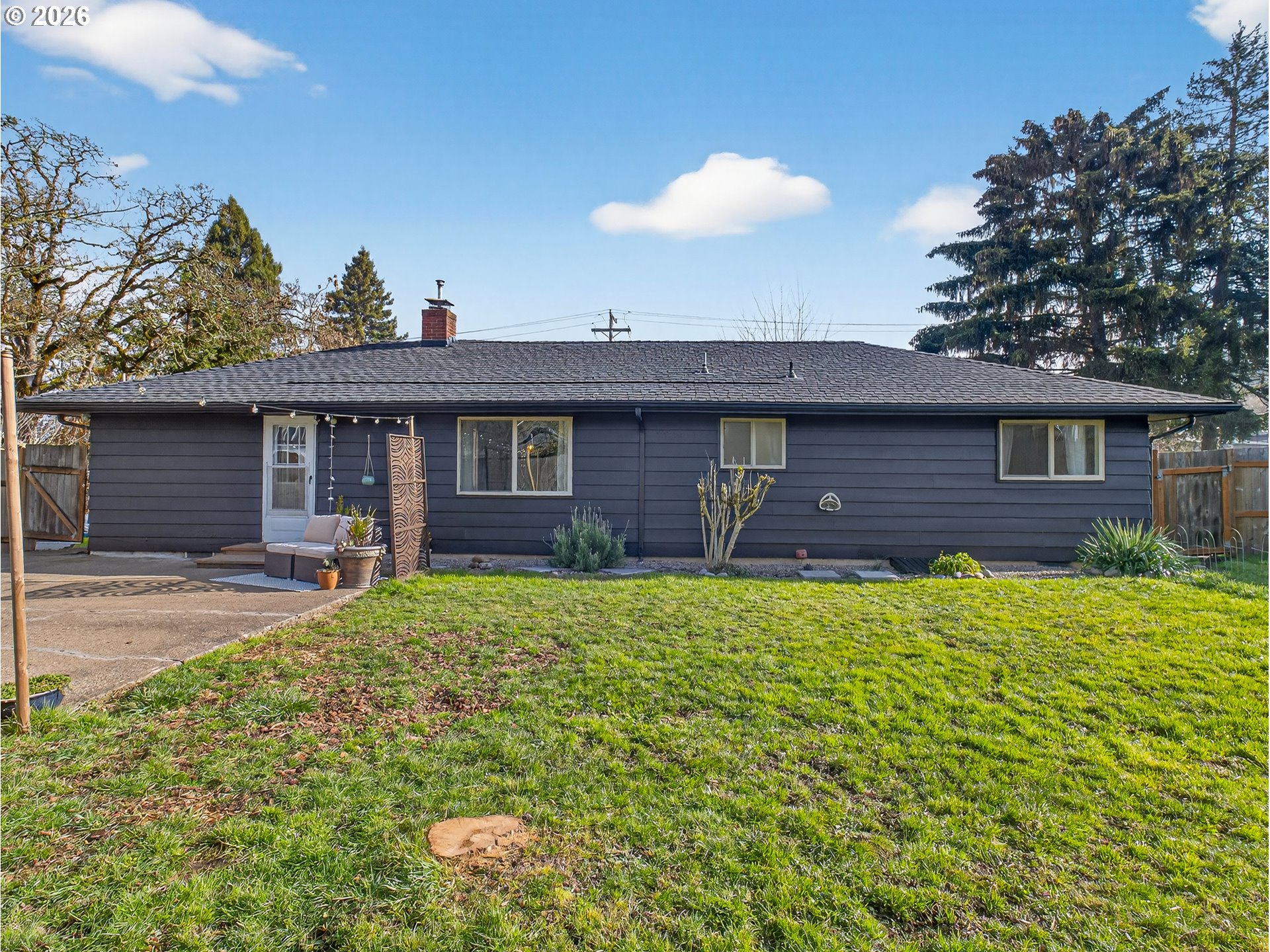 2230 Cleveland Street Eugene, OR 97405 - Photo 27 of 37 a front view of a house with a garden