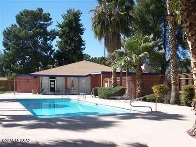 350 North Silverbell Road, Unit 94 Tucson, AZ 85745 - Photo 10 of 15 a house view with a garden space