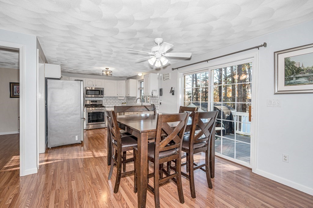 46 Parham Road Tyngsboro, MA 01879 - Photo 2 of 36 a view of a dining room with furniture window and wooden floor