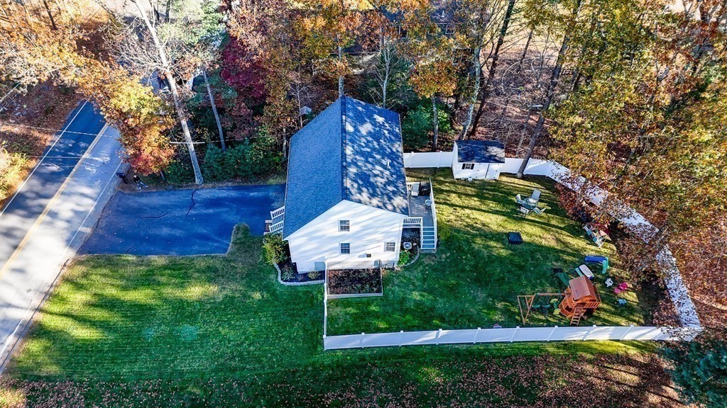 46 Parham Road Tyngsboro, MA 01879 - Photo 34 of 36 a aerial view of a house with a yard