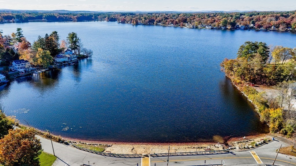 46 Parham Road Tyngsboro, MA 01879 - Photo 36 of 36 an ocean view with a table and chairs