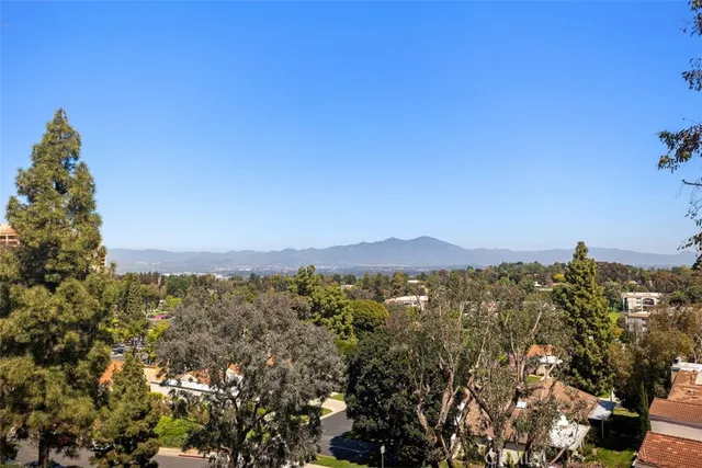 a view of a city with mountain