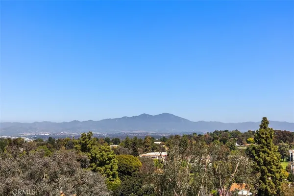 a view of a city with mountain