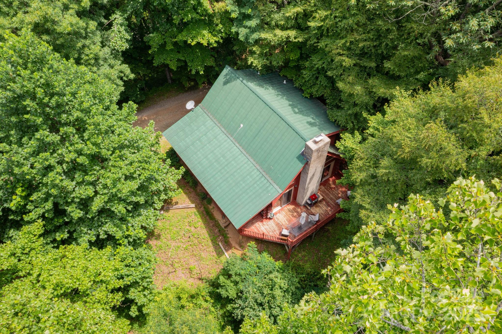 192 Granny Shepherd Road Mars Hill, NC 28754 - Photo 18 of 26 an aerial view of a backyard with outdoor seating