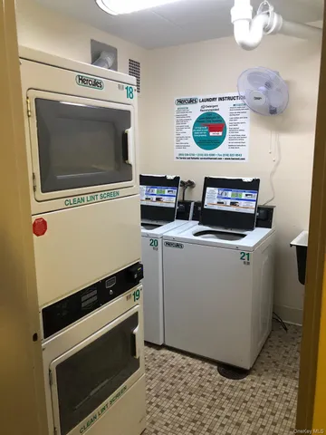 a utility room with washer and dryer