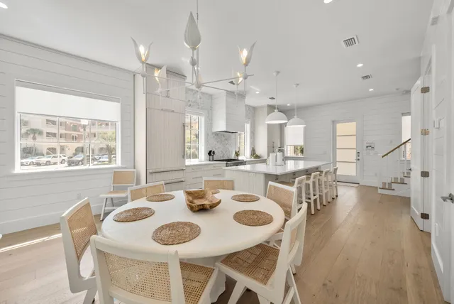 a bathroom with a bathtub sink and mirror