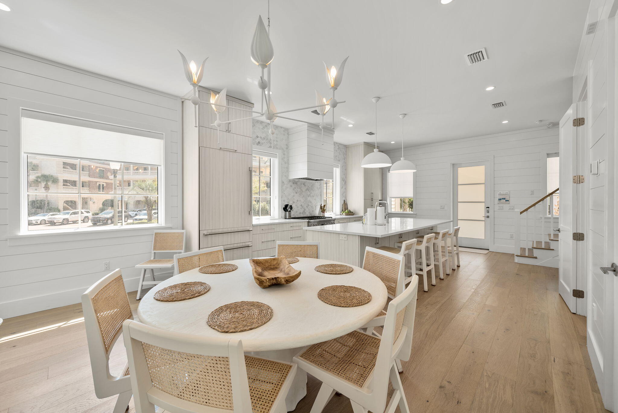 69 Trigger Trail Inlet Beach Inlet Beach, FL 32461 - Photo 11 of 50 a dining room with kitchen island furniture a large window and appliances