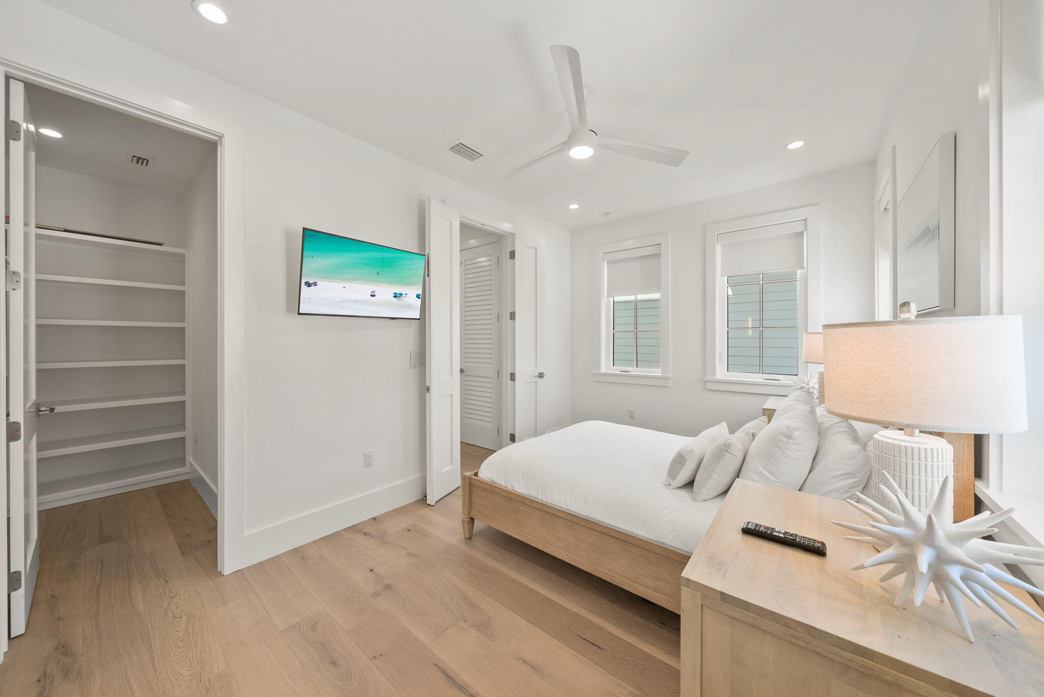 69 Trigger Trail Inlet Beach Inlet Beach, FL 32461 - Photo 18 of 50 a bedroom with a bed and a flat screen tv