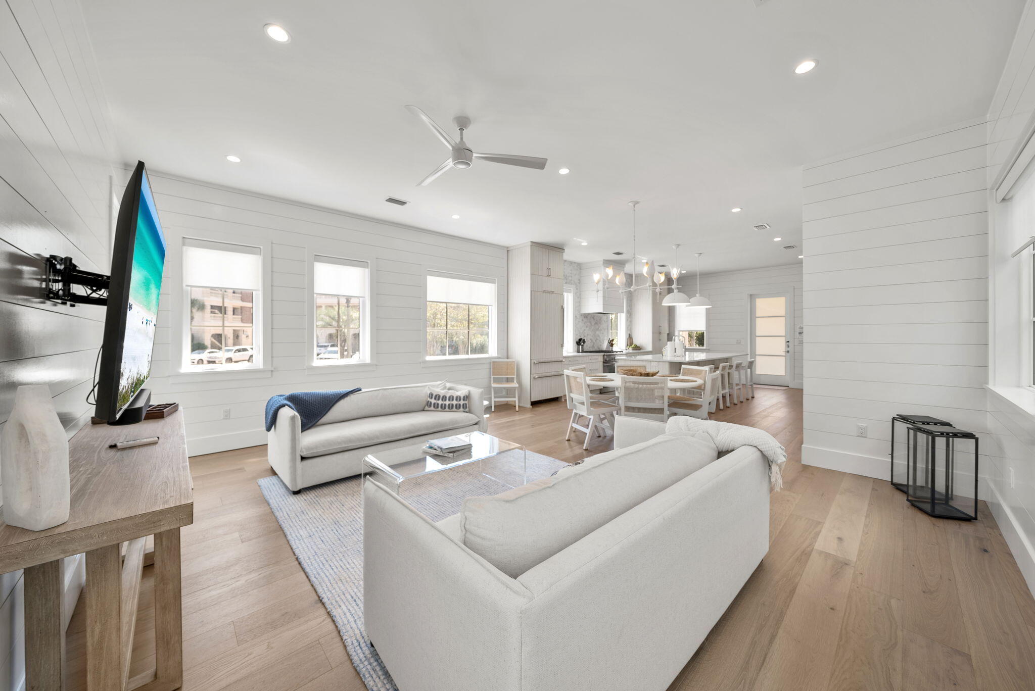 69 Trigger Trail Inlet Beach Inlet Beach, FL 32461 - Photo 6 of 50 a living room with furniture flat screen tv and large window