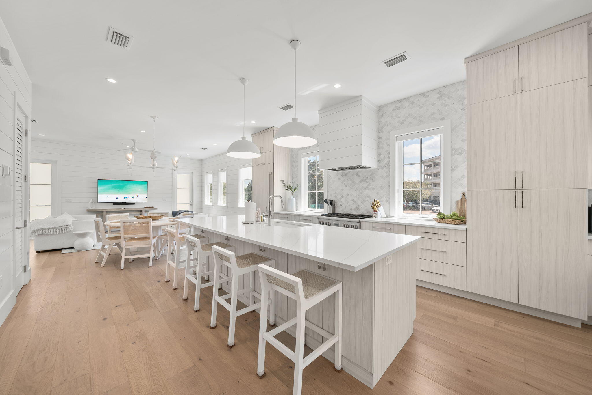 69 Trigger Trail Inlet Beach Inlet Beach, FL 32461 - Photo 9 of 50 a large kitchen with a large counter top space a sink stainless steel appliances and cabinets