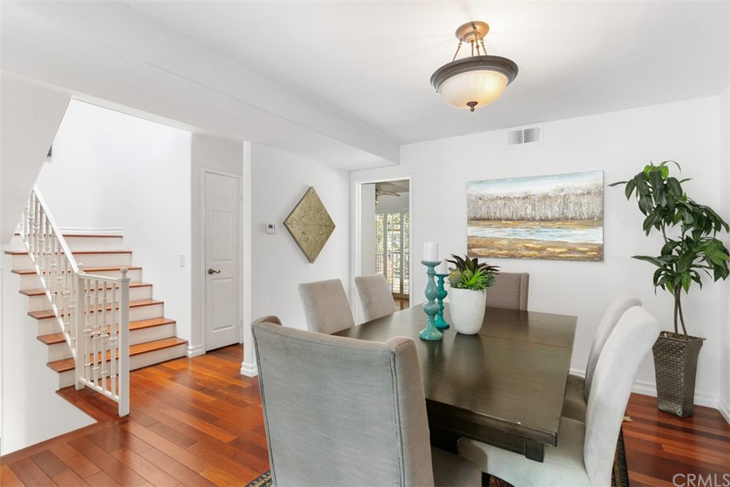 6051 Shadowbrook Circle Huntington Beach, CA 92648 - Photo 15 of 42 a living room with furniture and wooden floor