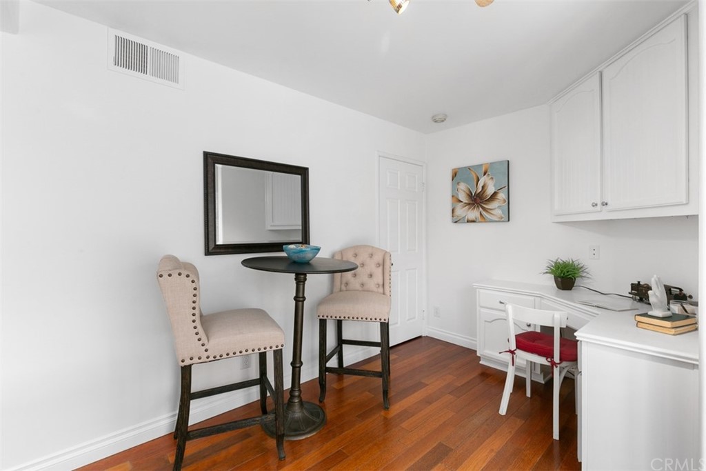 6051 Shadowbrook Circle Huntington Beach, CA 92648 - Photo 24 of 42 a room with a workspace