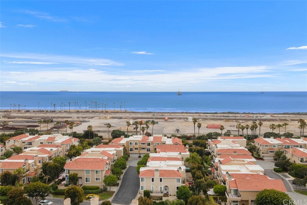 6051 Shadowbrook Circle Huntington Beach, CA 92648 - Photo 34 of 42 an aerial view of residential houses with outdoor space