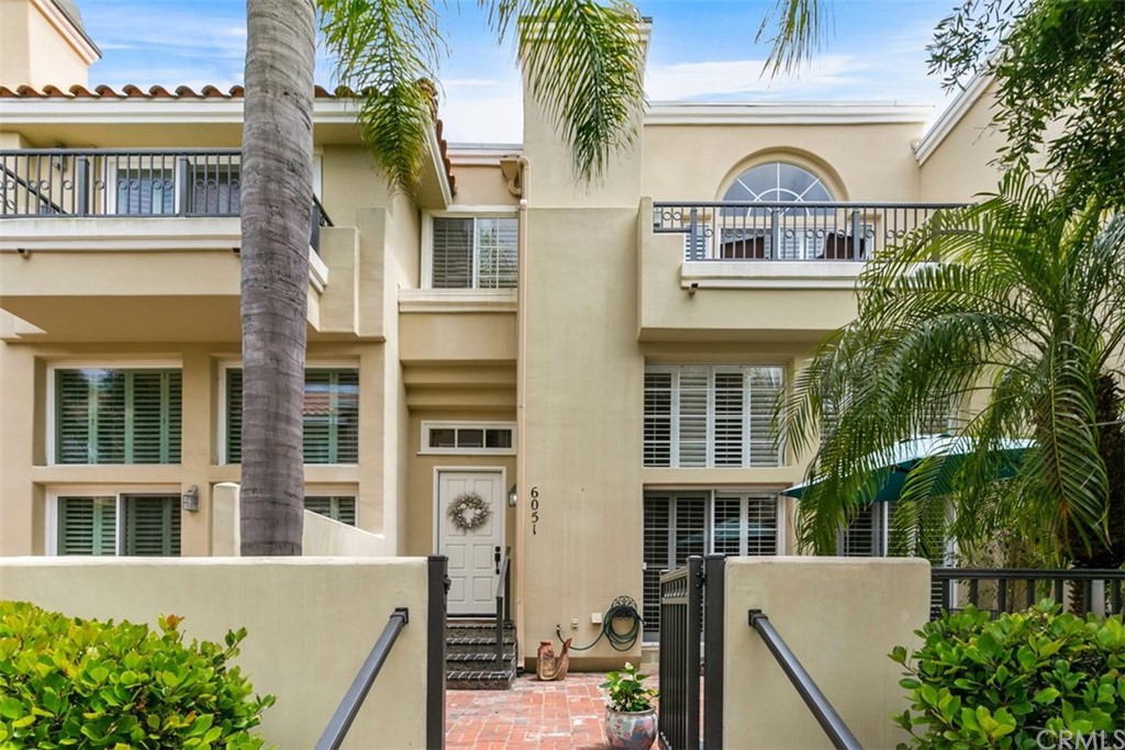 6051 Shadowbrook Circle Huntington Beach, CA 92648 - Photo 4 of 42 front view of a building