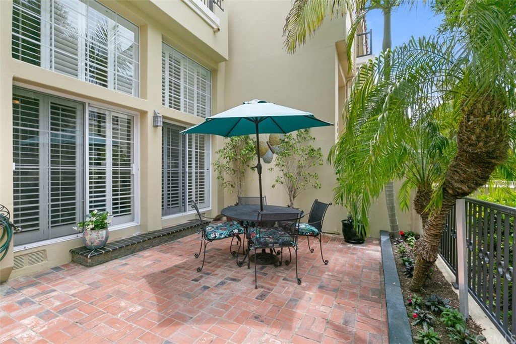 6051 Shadowbrook Circle Huntington Beach, CA 92648 - Photo 6 of 42 a garden view with a seating space
