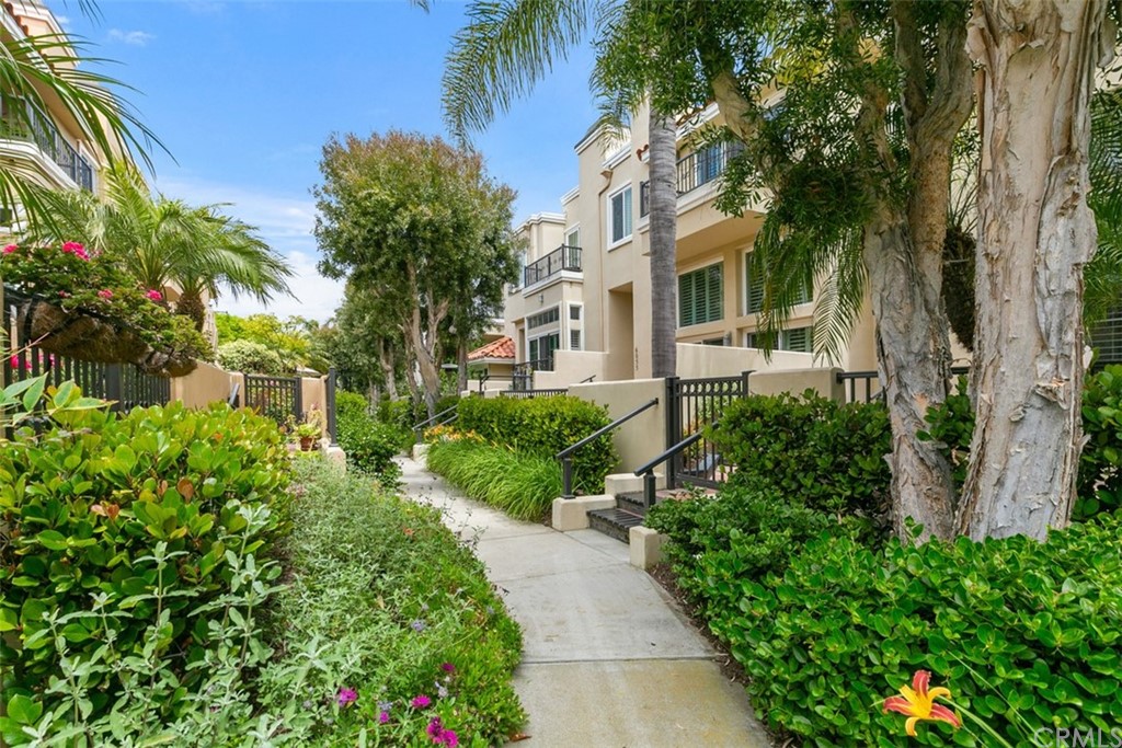 6051 Shadowbrook Circle Huntington Beach, CA 92648 - Photo 7 of 42 a view of a garden with plants
