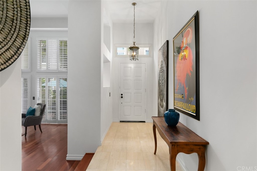 6051 Shadowbrook Circle Huntington Beach, CA 92648 - Photo 8 of 42 a bathroom with a sink and a mirror