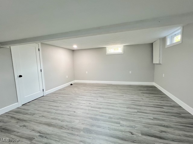6285 Adams Road Northeast New Philadelphia, OH 44663 - Photo 20 of 32 Below grade area with light wood finished floors and baseboards