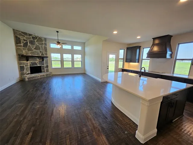 a open kitchen with a sink and dish washer