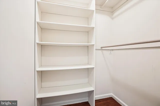 a view of an empty walk in closet