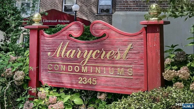 a view of a building with a yard