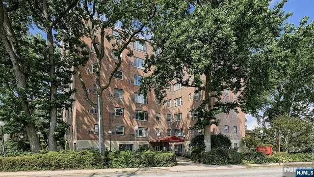 a view of a brick building with a large windows