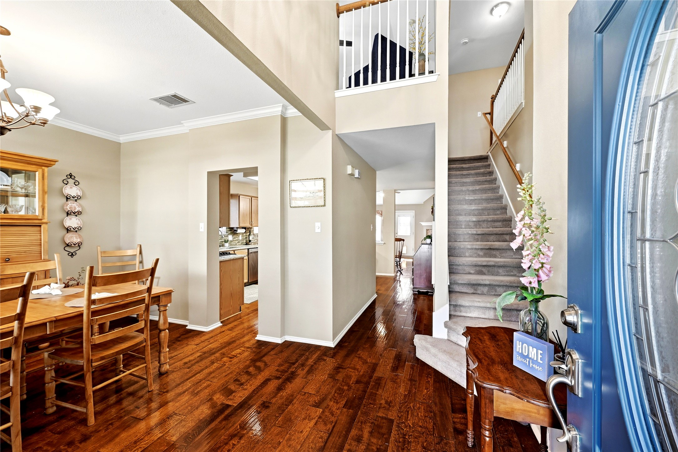 Charming Entry with Gleaming Hardwoods and High Ceilings
