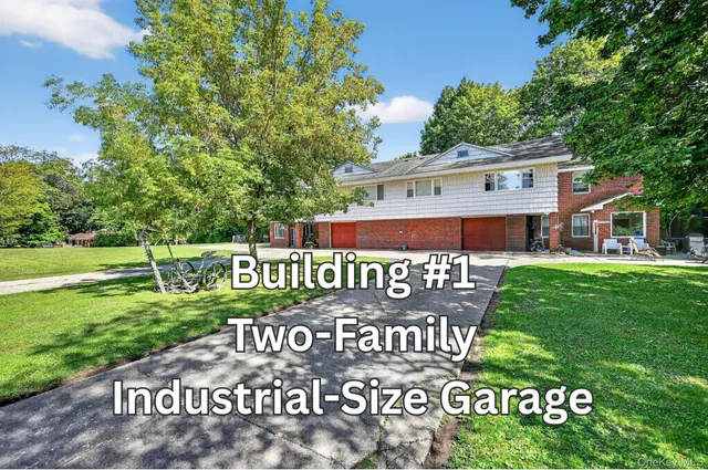 a view of an house with backyard space and deck