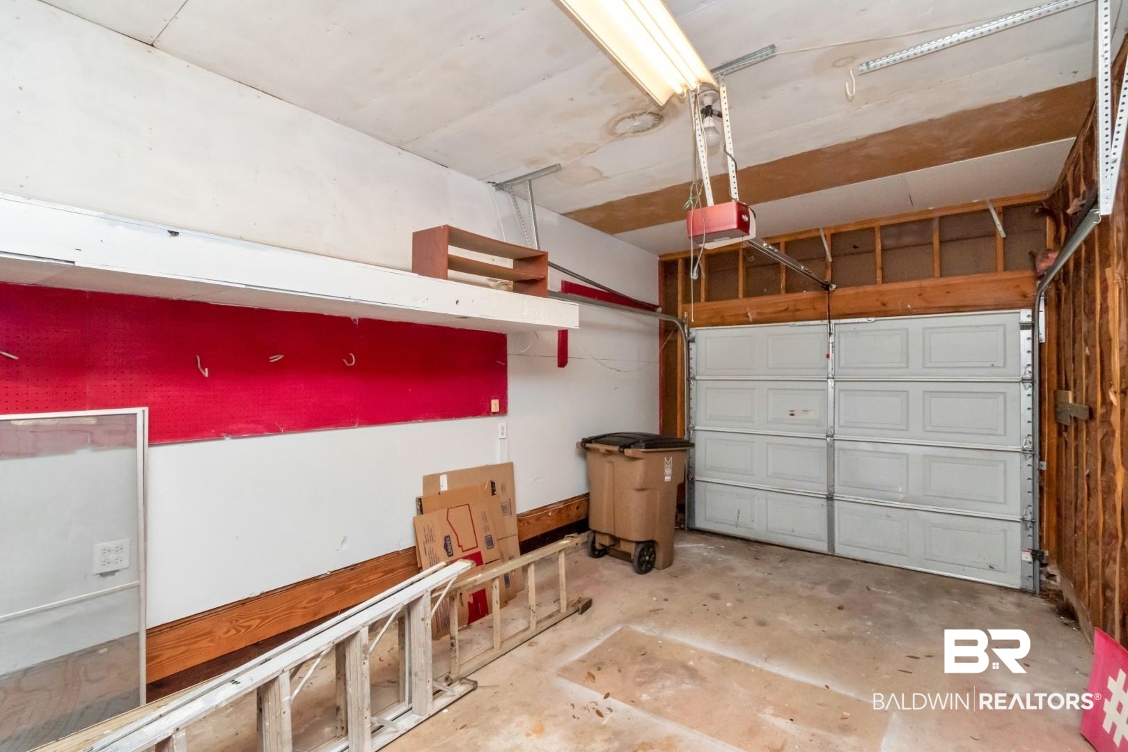 320 Vanderbilt Drive Mobile, AL 36608 - Photo 31 of 39 Garage featuring a garage door opener