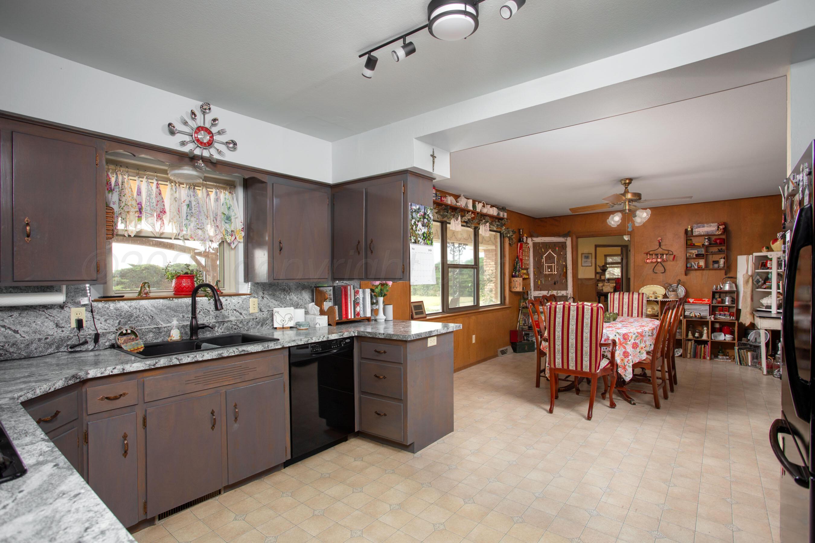 5003 Klinke Road Amarillo, TX 79108 - Photo 12 of 35 Kitchen to dining view