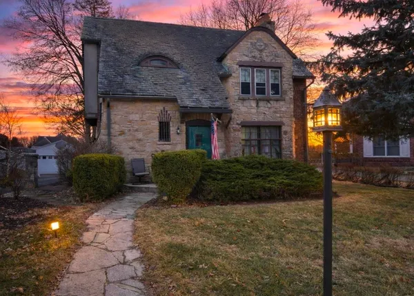 a view of a house with a garden