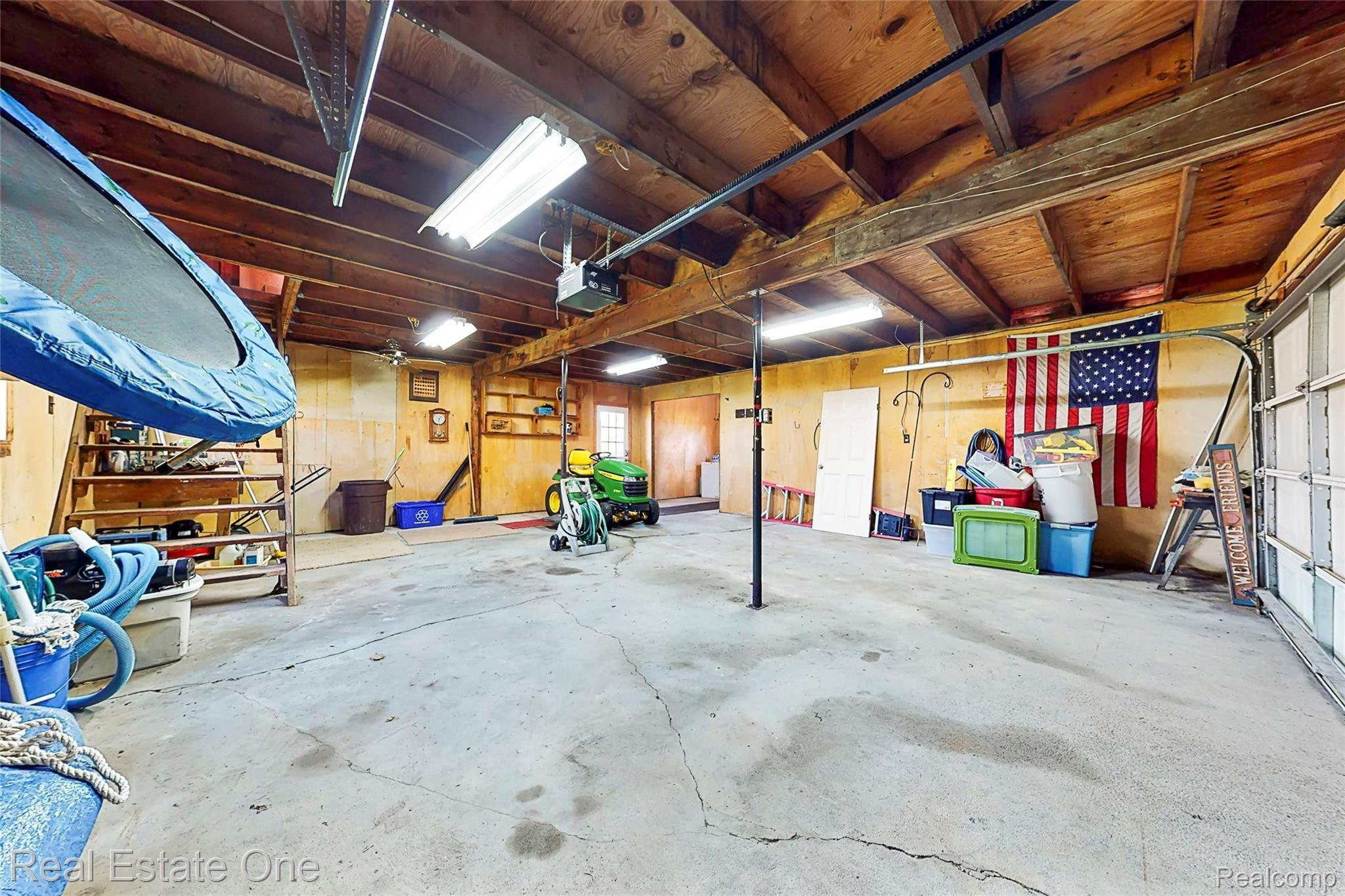 8120 Green Road Fenton, MI 48430 - Photo 44 of 46 2 car garage with bonus room upstairs for you to finish.