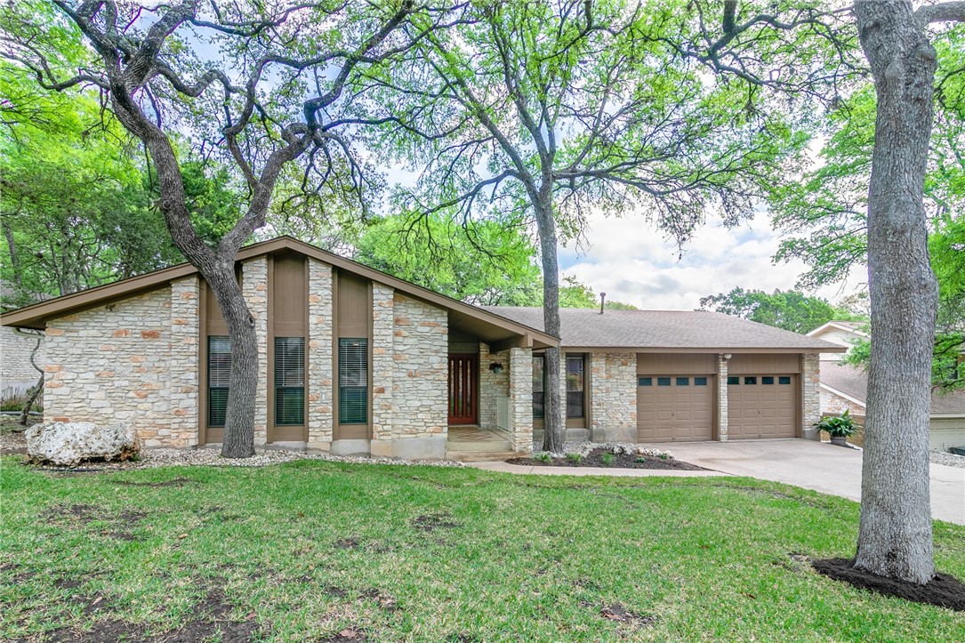 7000 Narrow Oak Trail Austin, TX 78759 - Photo 1 of 1 front view of a house with a yard