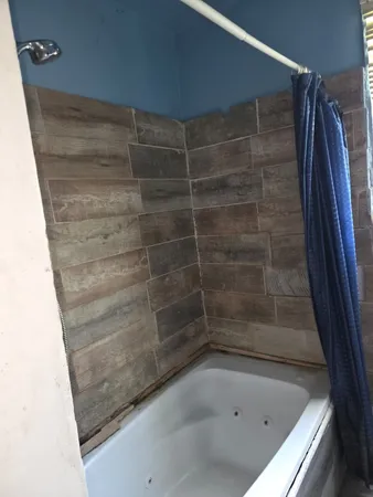 a bathroom with a bathtub