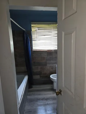 a bathroom with a toilet