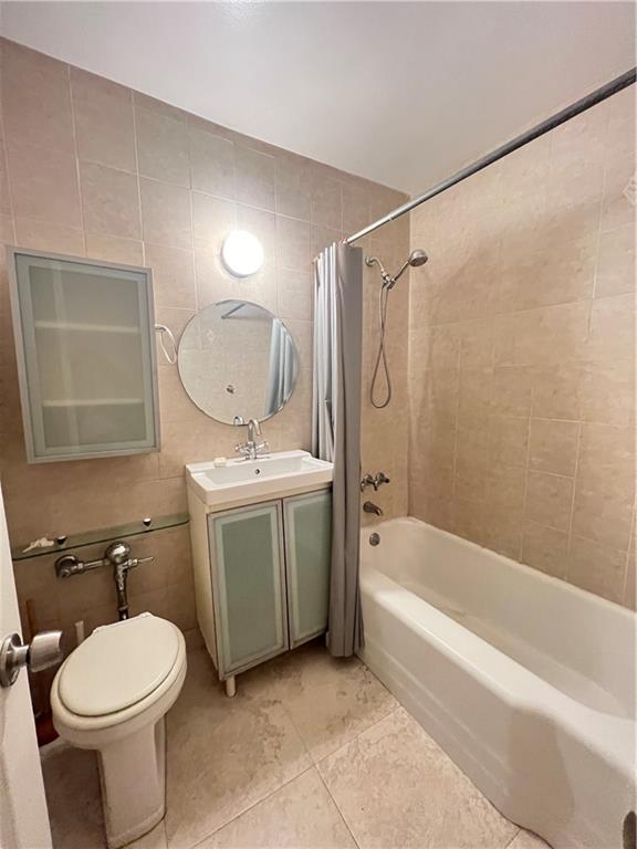 2678 Ocean Avenue, Unit L4 Brooklyn, NY 11229 - Photo 3 of 11 a bathroom with a sink toilet and shower