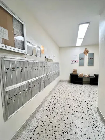 a bedroom with furniture and wooden floor