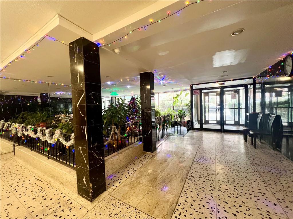2678 Ocean Avenue, Unit L4 Brooklyn, NY 11229 - Photo 9 of 11 a view of a chairs and tables in patio of a house