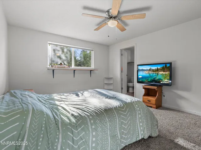 an aerial view of residential house with outdoor space and mountain view
